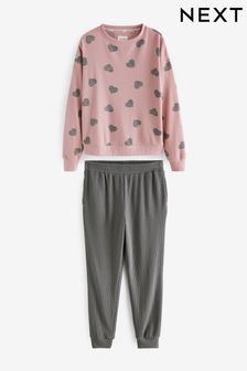 Pinkfarben mit Herzen - Langärmeliger Pyjama mit Waffelstruktur (U13852) | 27 €