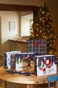 Set of 4 Santa Scene Christmas Gift Bags (U14363) | DKK50