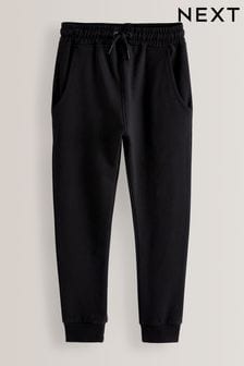 Czarne o większej długości - Wąskie spodnie dresowe (3-16 lat) (U50097) | 60 zł - 90 zł