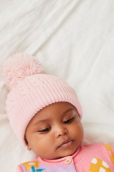 Roz pal - Căciuliță tricotată cu ciucure pentru bebeluși (0 luni - 2 ani) (U50787) | 50 LEI