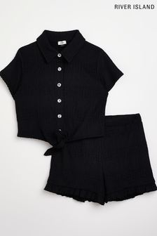 סט חולצה עם קשירה ומכנסיים קצרים של River Island לבנות בשחור (U63628) | ‏130 ₪ - ‏186 ₪