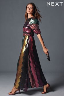 Arcoíris multicolor - Vestido de fiesta a media pierna de manga larga con diseño ondulado y lentejuelas (U63993) | 75 €