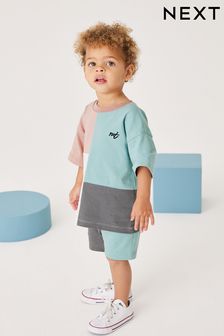  (U66688) | HK$122 - HK$157 藍色/粉色超大版型 - 短袖拼色T恤和短褲套裝 (3個月至7歲)