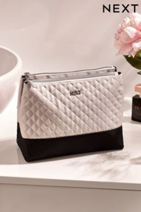 Crema/negro con diseño guateado - Neceser crema/negro plegable con diseño acolchado (U67875) | 15 €