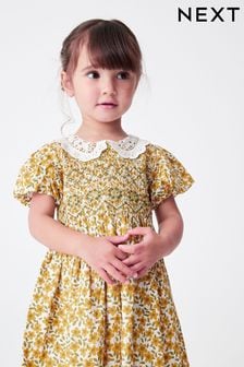 Ochre Yellow Floral Printed Lace Collar Shirred Cotton Dress (3mths-8yrs) (U75165) | 19 € - 25 €