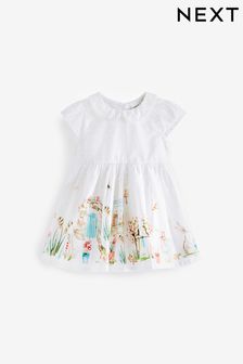 White Character Scene Print Baby Prom Dress (0mths-2yrs) (UZ7559) | €6.50 - €7.50