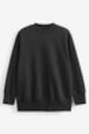 črna - Relaxed Fit Essentials Longline zgornji del trenirke; majica za treniranje - Slika 1 iz 1