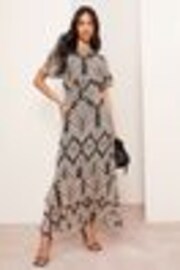 Friends Like These Black Short Sleeve Chiffon Tiered Maxi Dress - Image 1 of 1