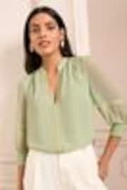 Love & Roses Green V-Neck Hardware Long Sleeve Blouse - Image 1 of 1