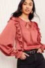 Friends Like These Pink Long Sleeve Ruffle Trim Tie Front Blouse - Image 1 of 1