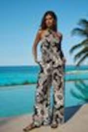 Lipsy Black/White Printed Halter Neck Sleeveless Jumpsuit - Image 1 of 1