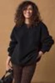 Black Print Relaxed Fit Teddy Borg Fleece Cord Back Longline Crew Neck Sweatshirt - Image 1 of 1