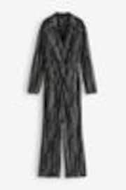 Black/White Geo Print Long Sleeve Plissé Jumpsuit - Image 1 of 1