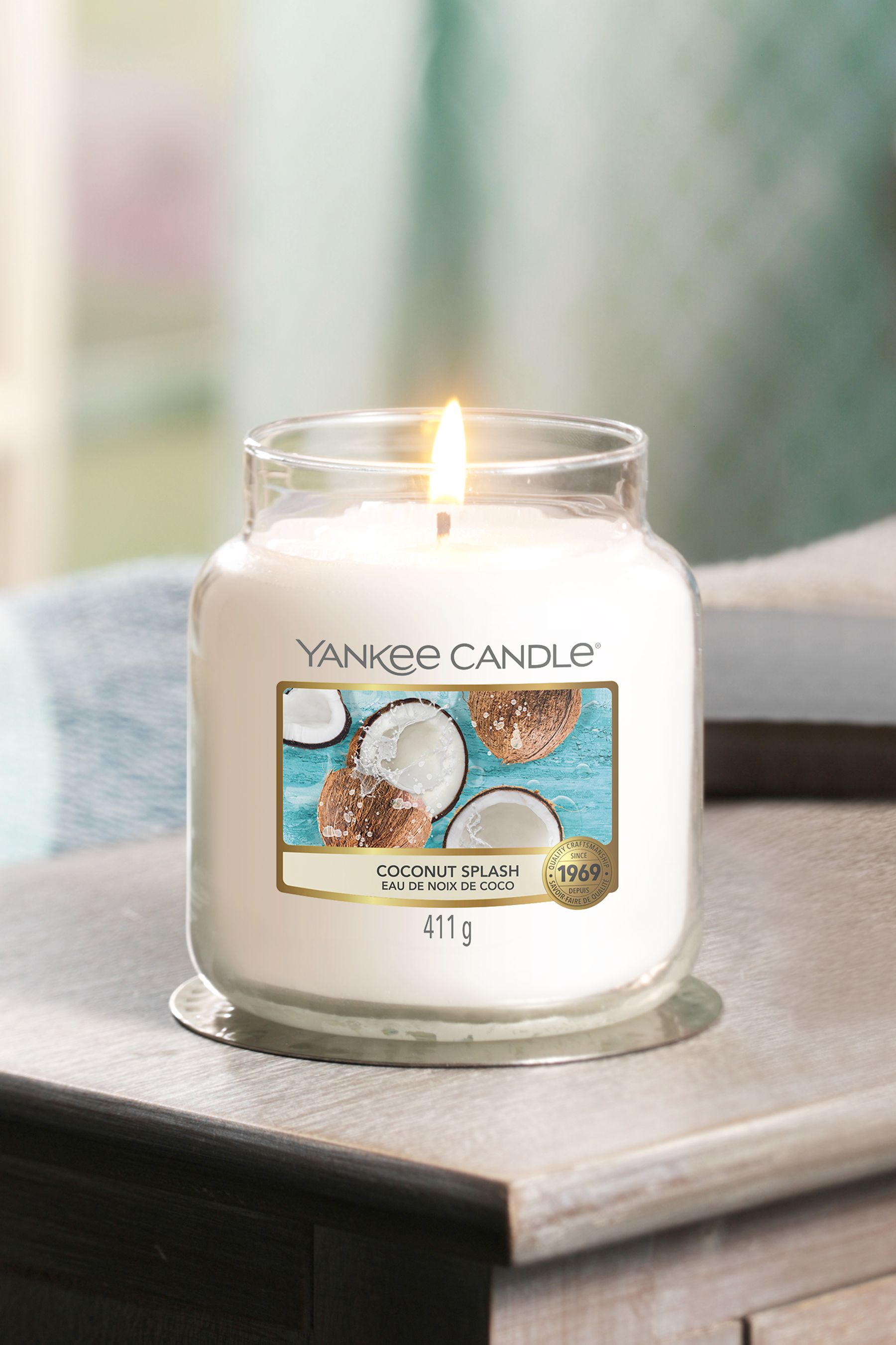 Buy Yankee Candle White Coconut Splash Medium Jar Candle from the Next