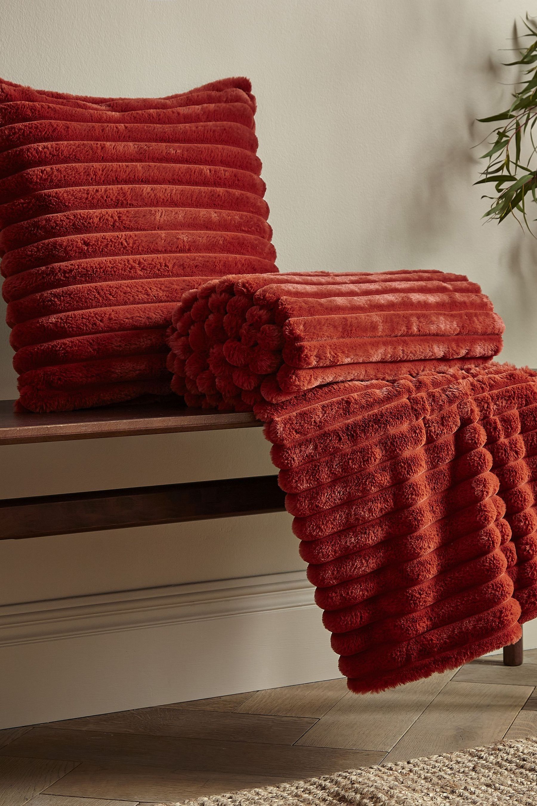 Buy Catherine Lansfield Orange Soft and Cosy Ribbed Faux Fur Throw from