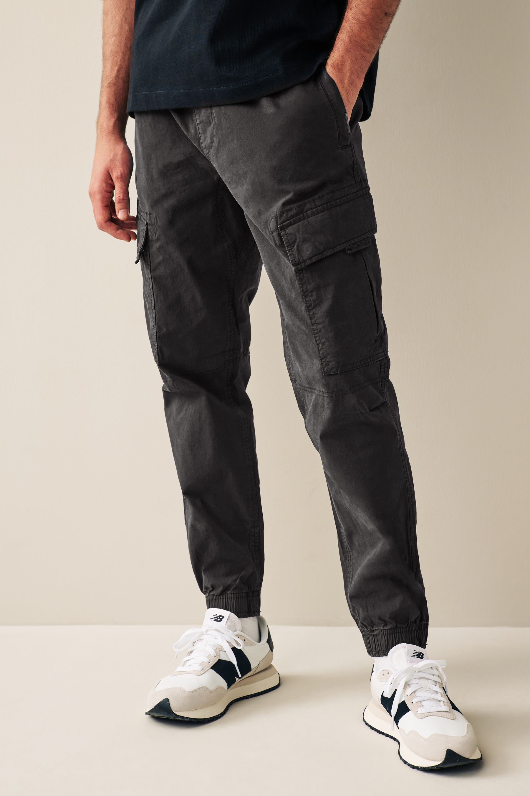 Buy Black Regular Tapered Stretch Utility Cargo Trousers from the Next ...