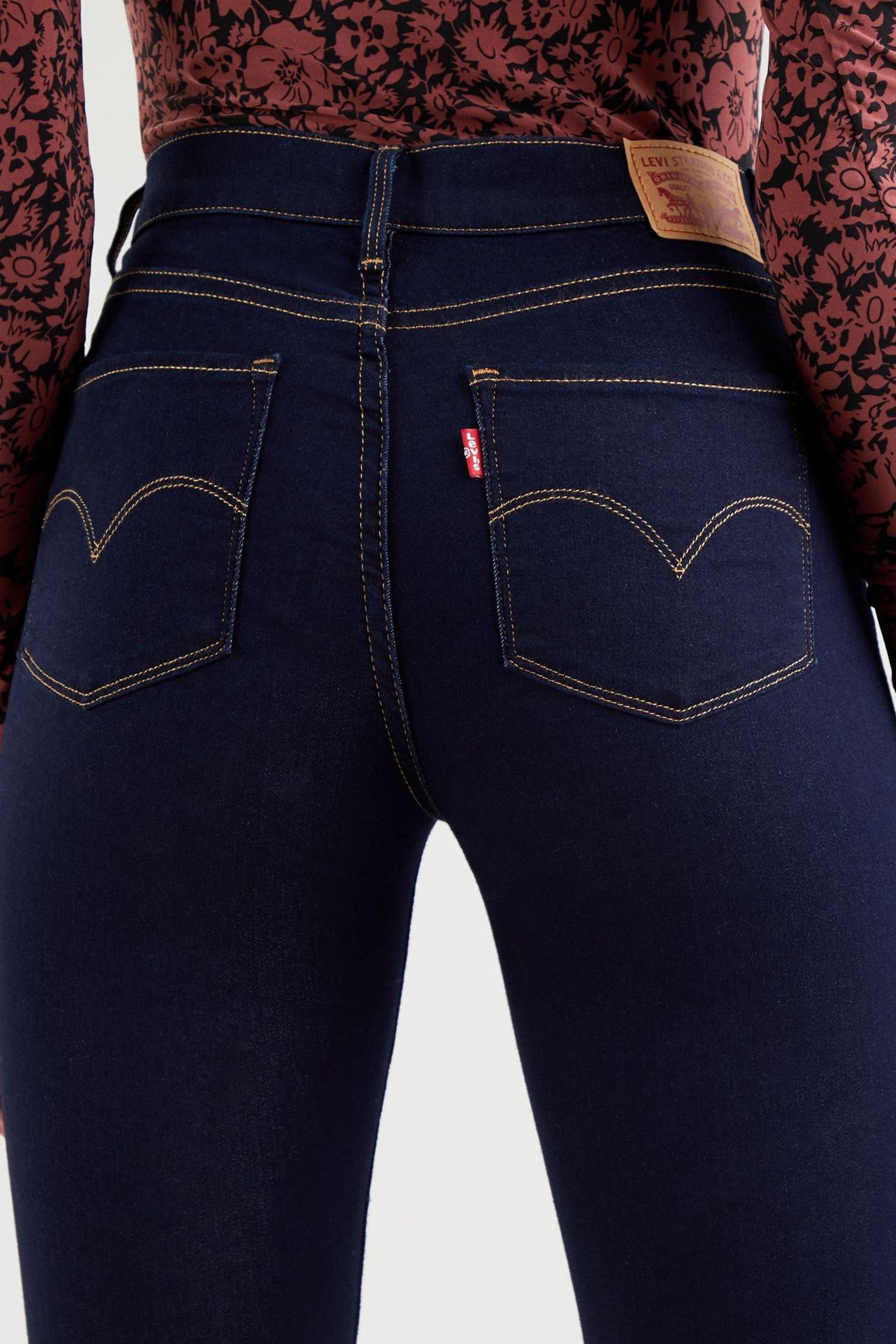 Buy Levi's® Darkest Sky 312™ Shaping Slim Jeans from the Next UK online ...
