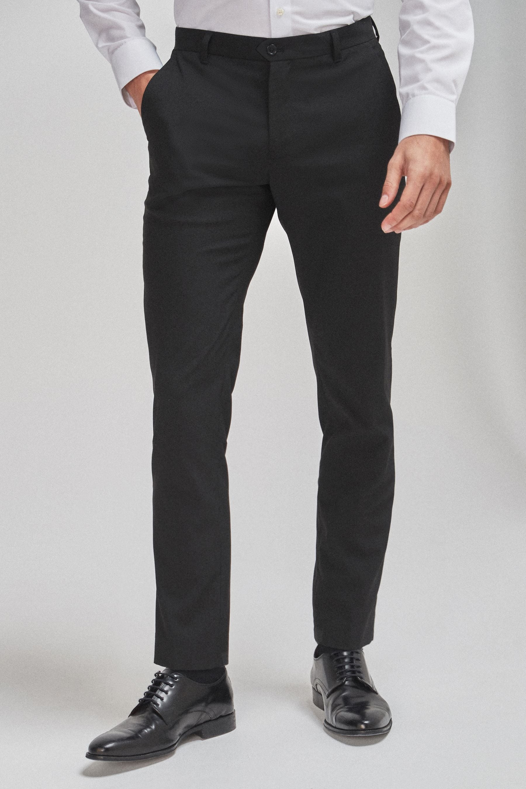 Buy Black Slim Tapered Stretch Smart Trousers from the Next UK online shop