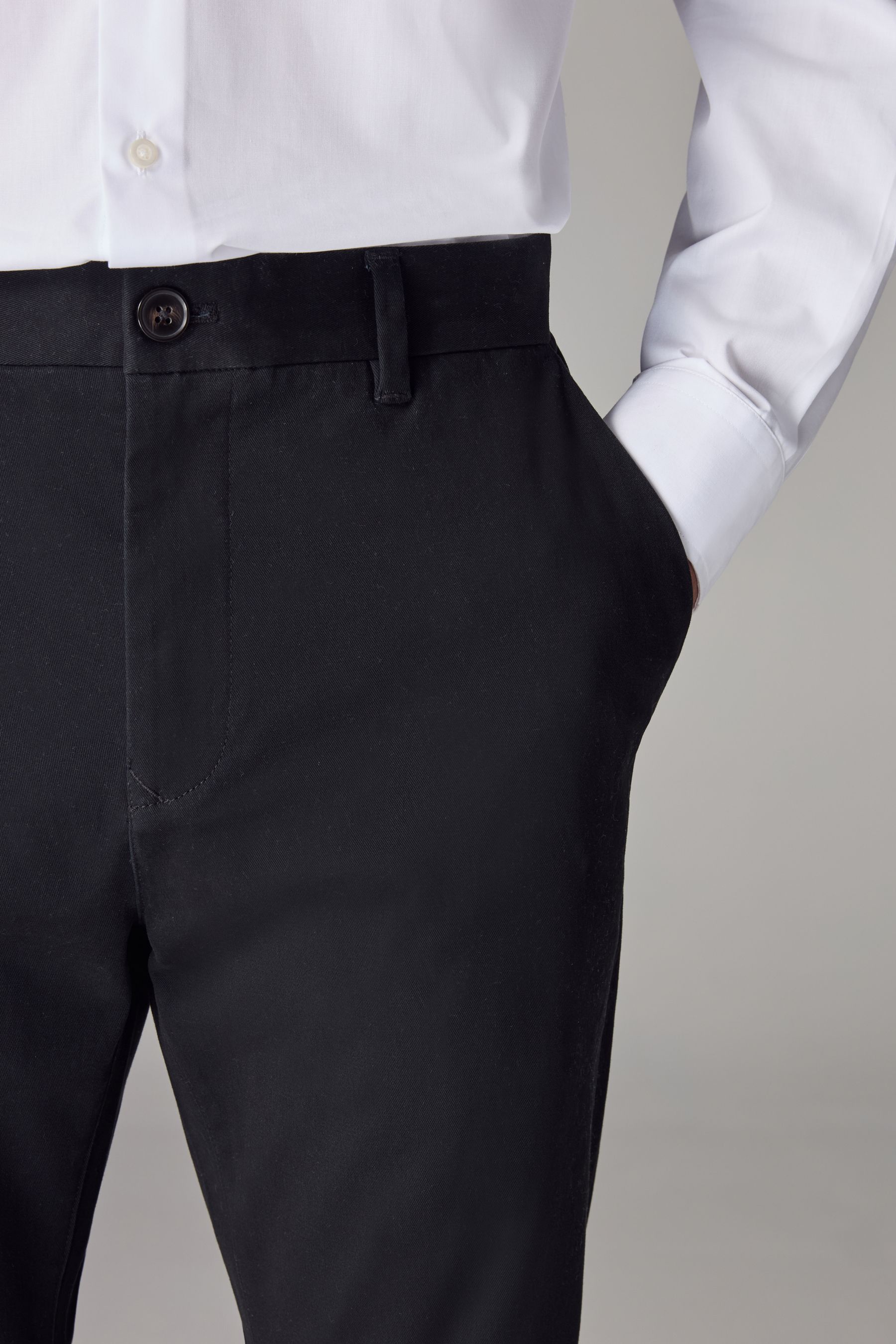 Buy Black Skinny Fit Stretch Chino Trousers from the Next UK online shop