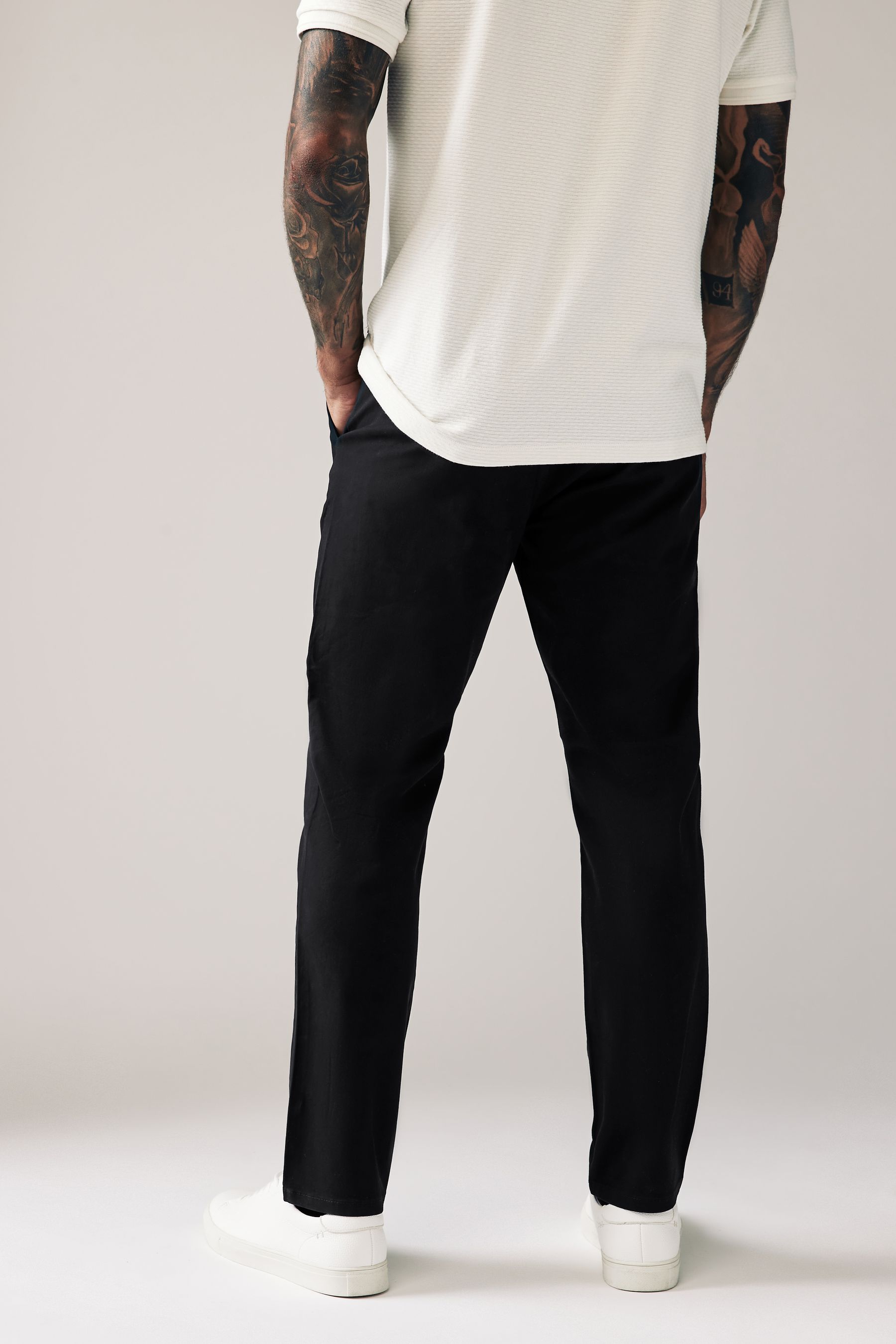 Buy Black Slim Stretch Chinos Trousers from the Next UK online shop