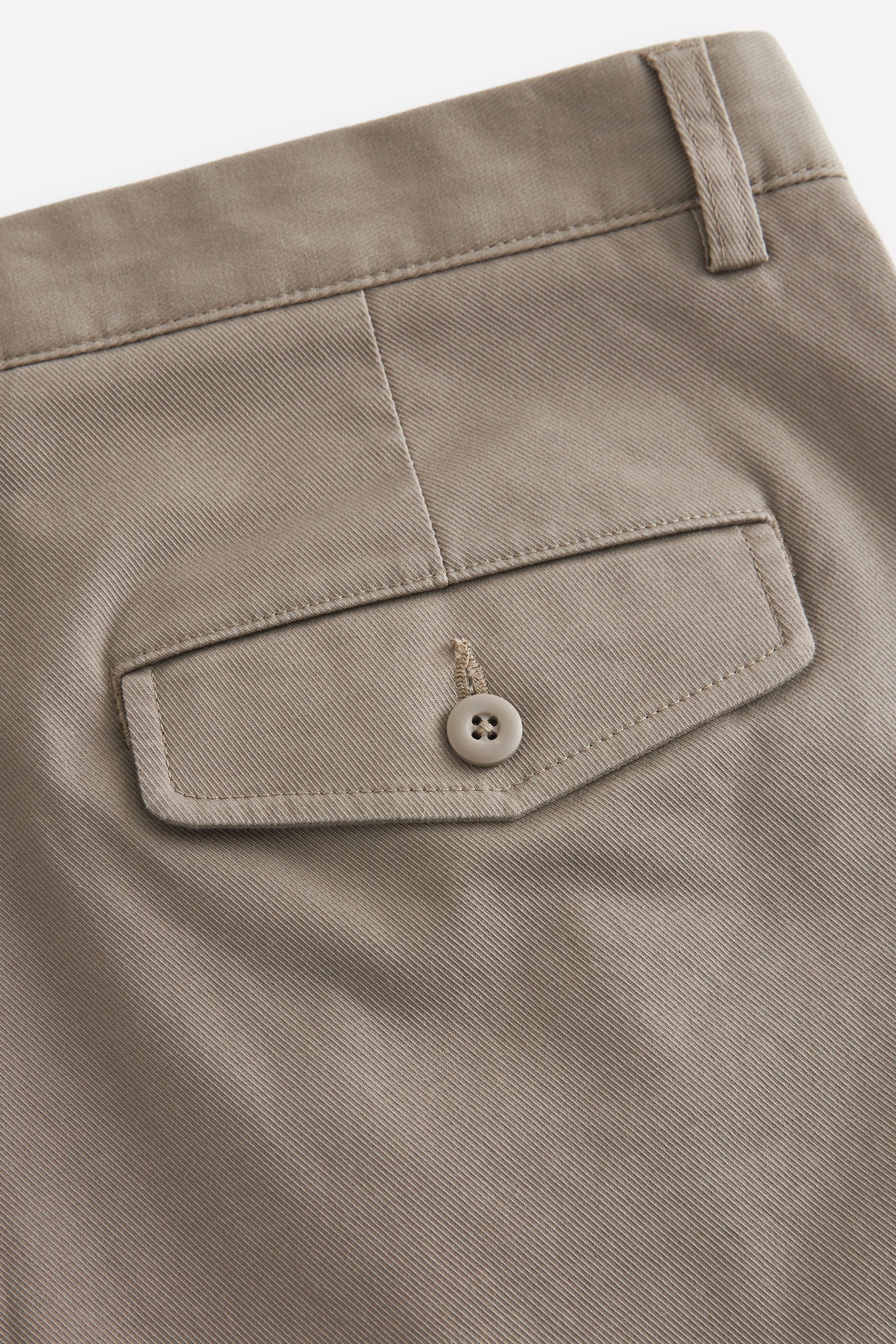 Buy Grey Twin Pleat Stretch Chinos Trousers from the Next UK online shop