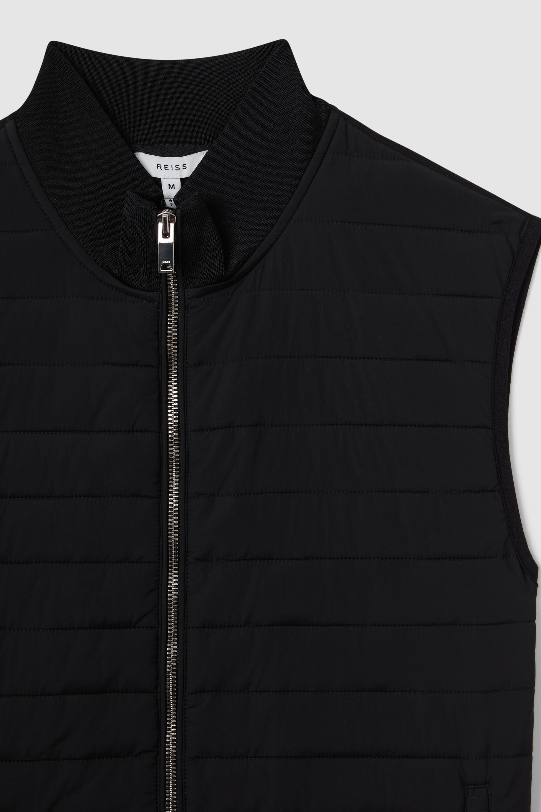 Buy Reiss Black Pluto Hybrid Quilt and Knit Zip-Through Gilet from the ...