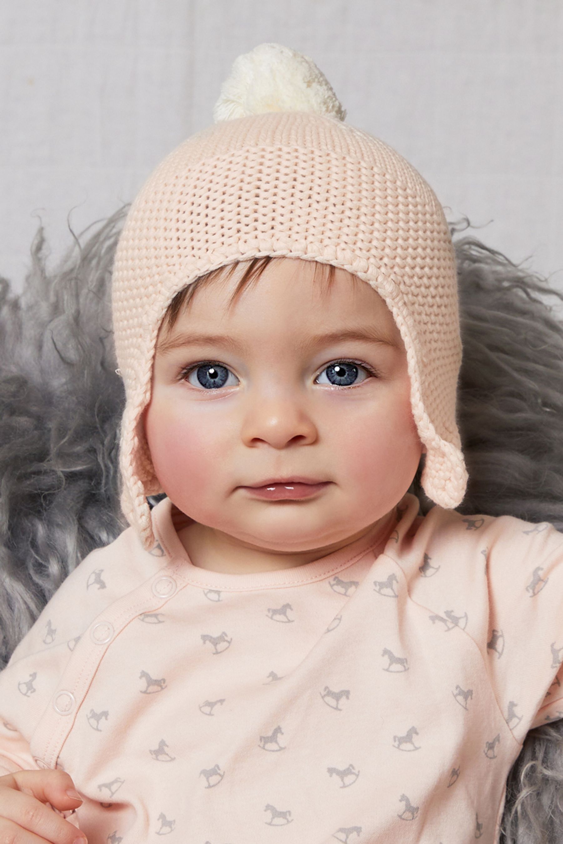 Buy The Little Tailor Baby Knitted Trapper Hat with Pom Pom from Next