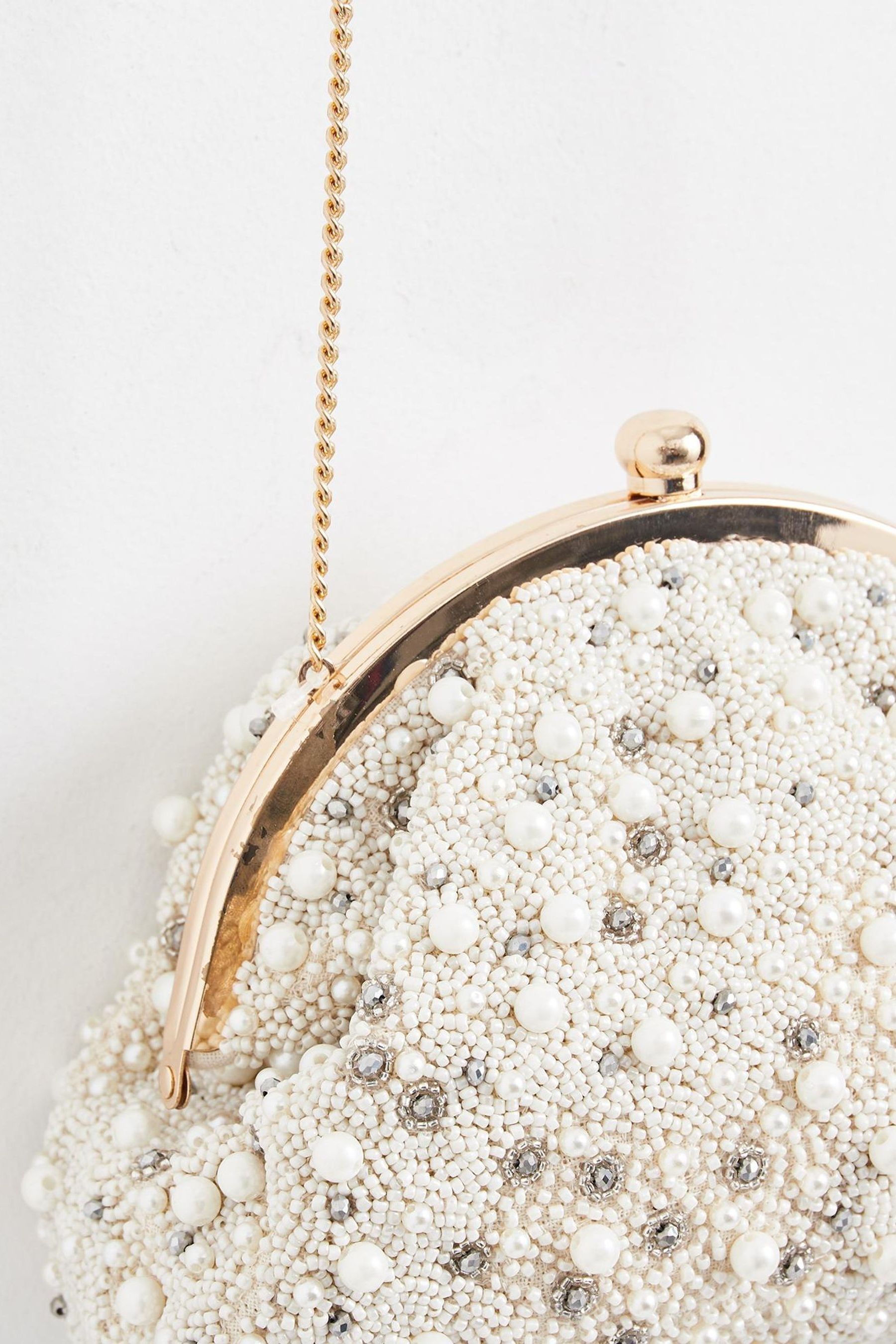 Buy Oliver Bonas Cream Faux Pearl Cotton Money Clutch Bag from Next Ireland