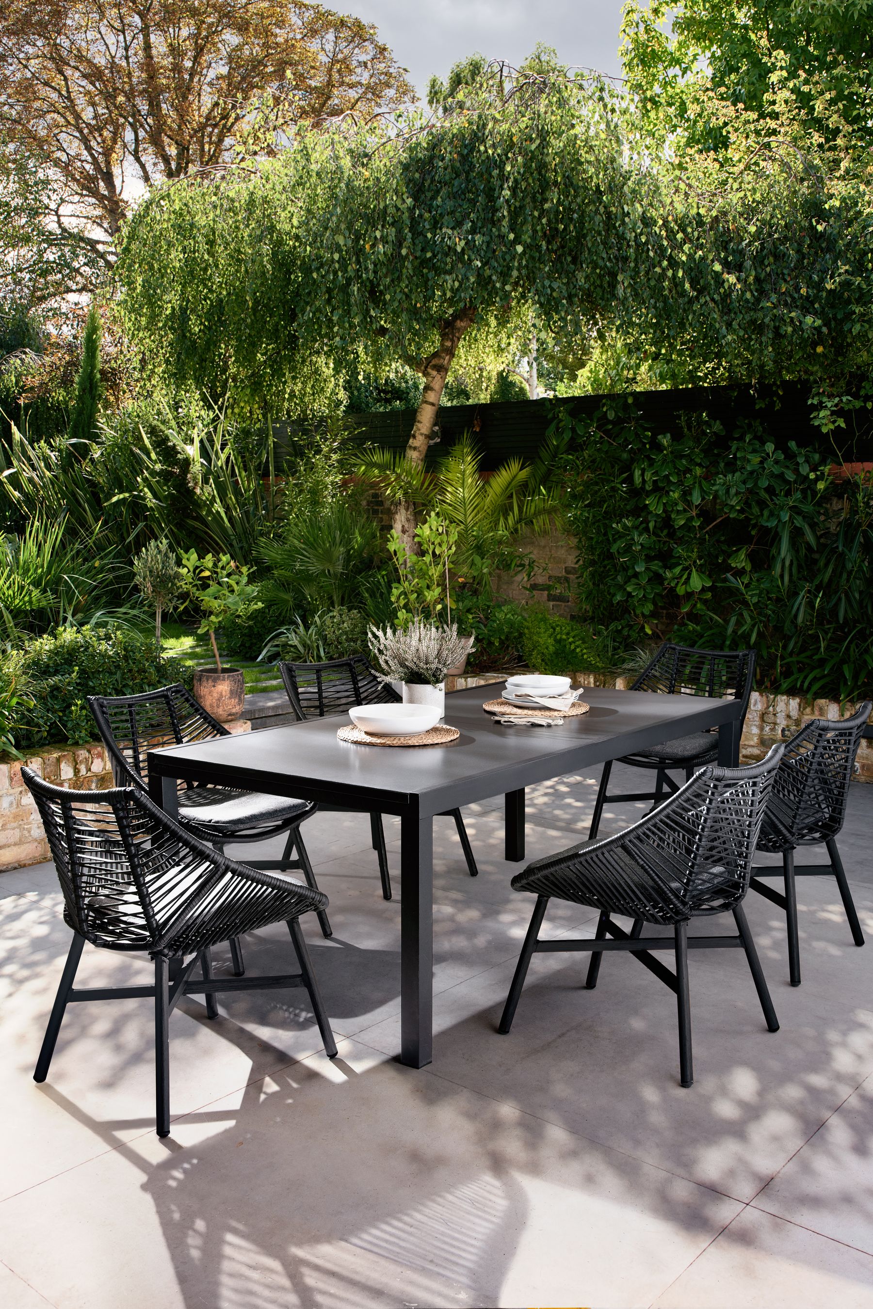 Buy Black Helsinki Garden 8 Seat Extending Dining Set from the Next UK
