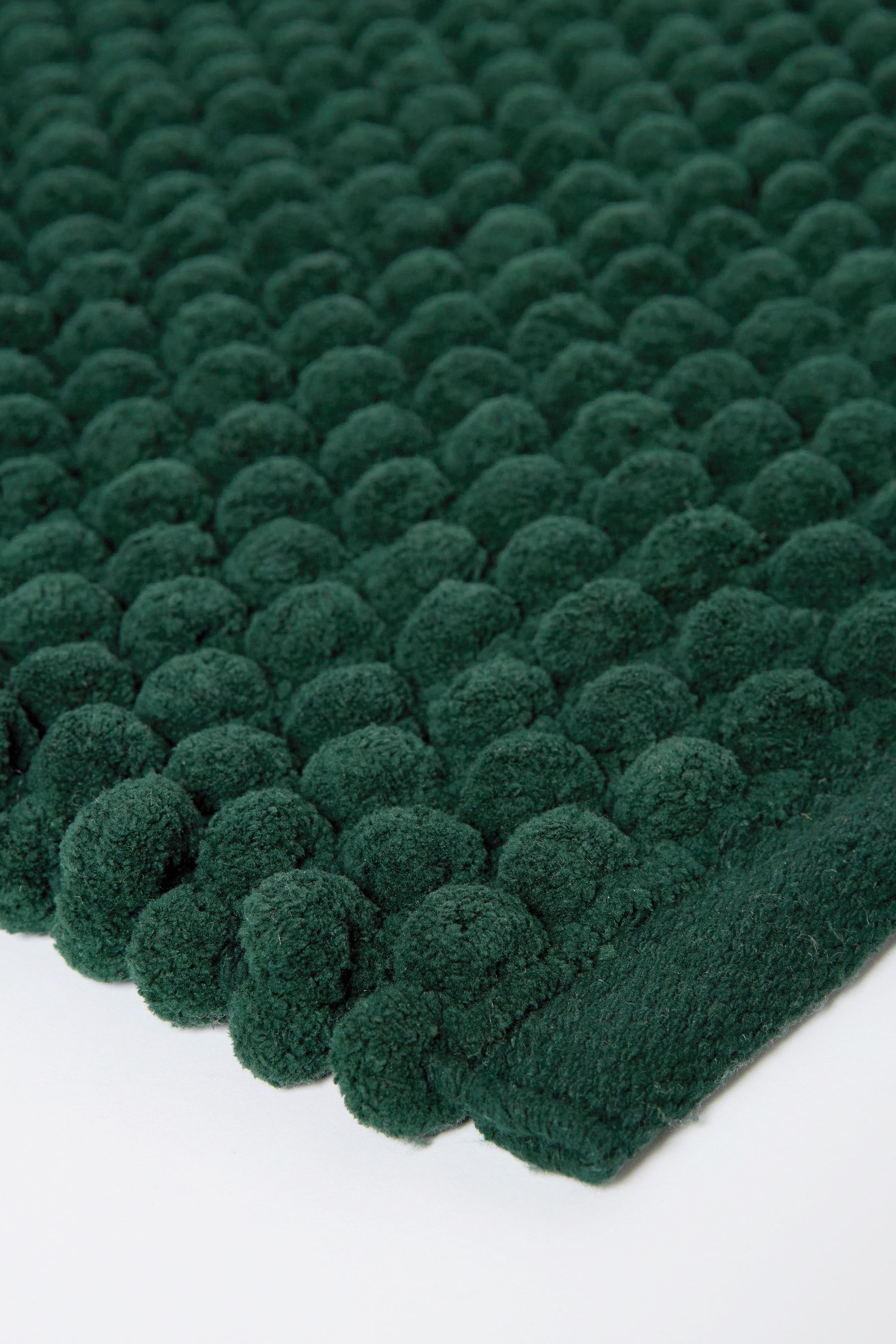 Buy Bottle Green Giant Bobble Runner Bath Mat from Next Ireland