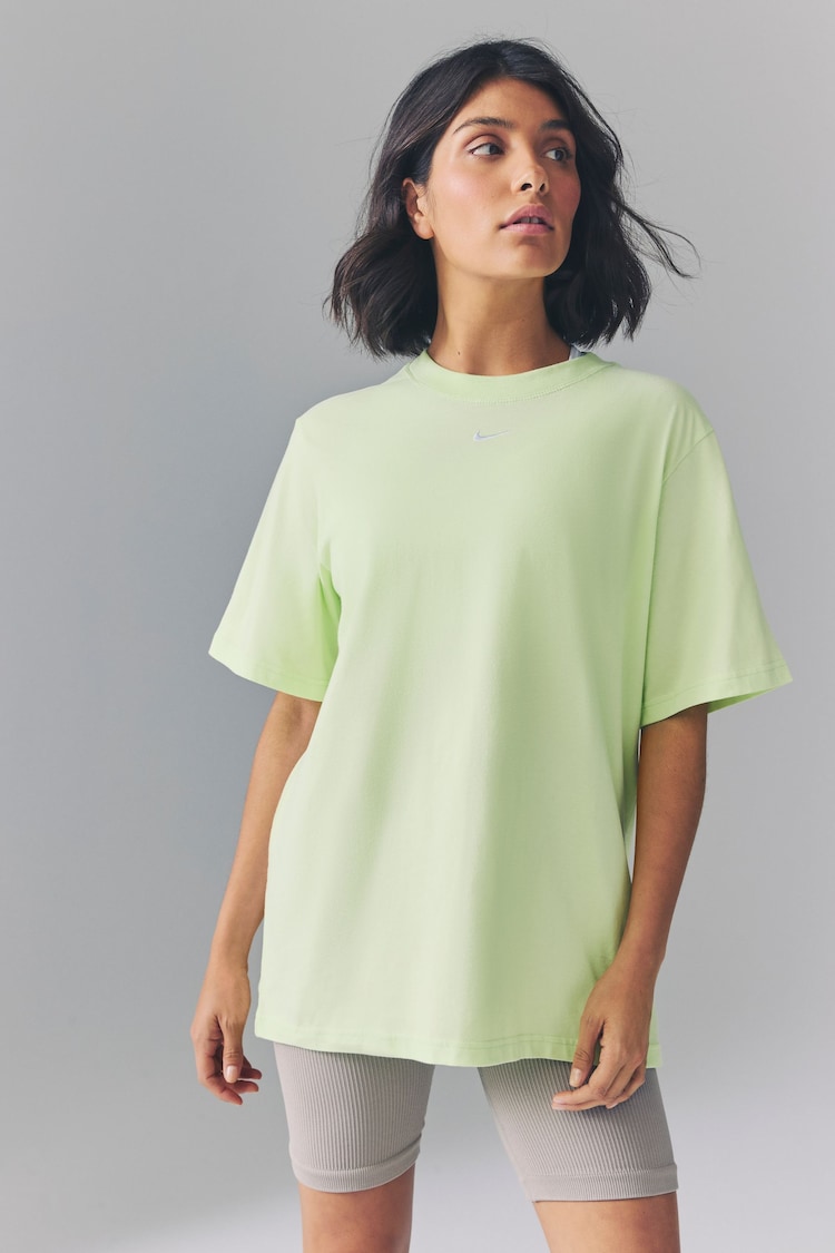 Nike Lime Green Oversized Mini Swoosh Sportswear T-Shirt - Image 1 of 1