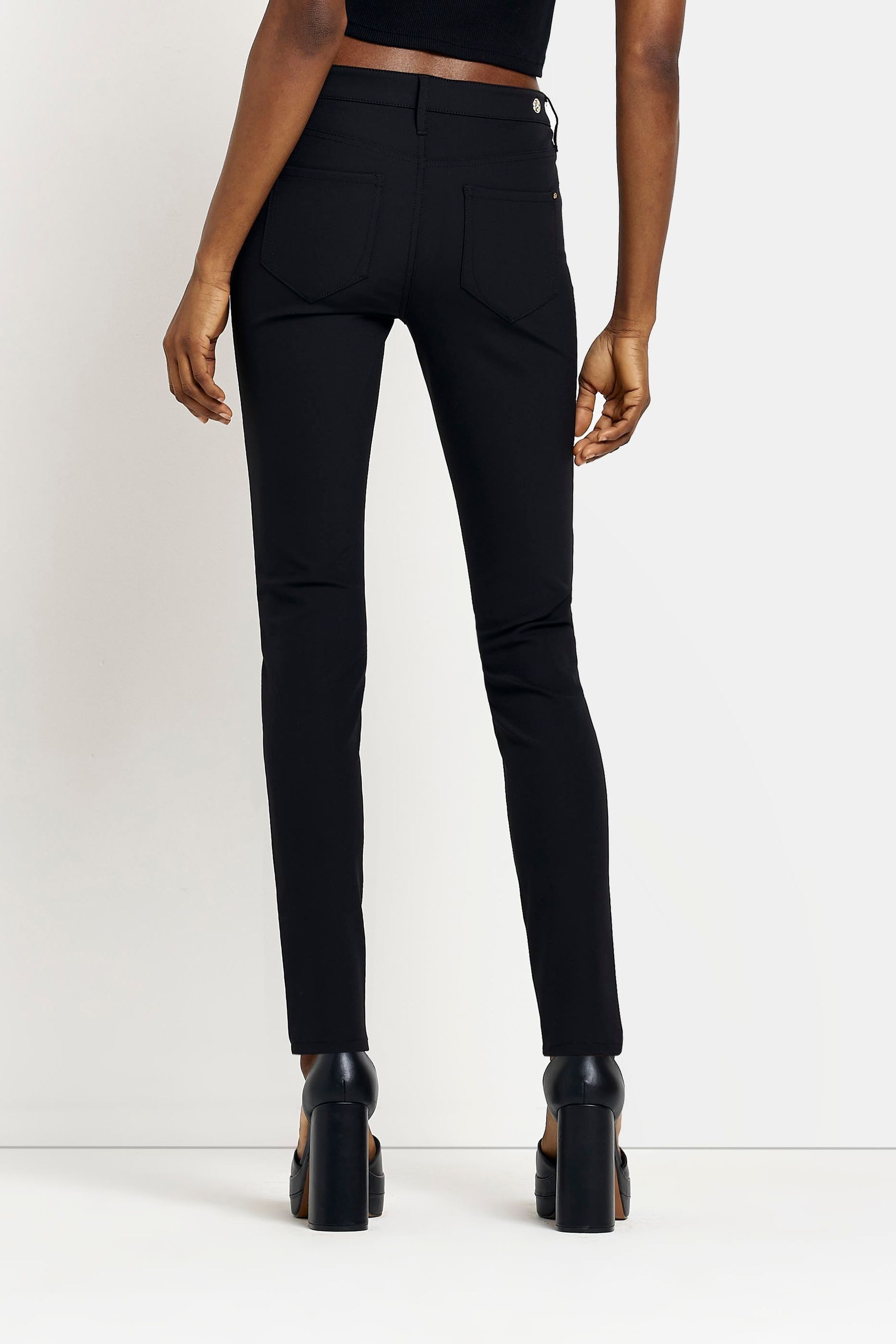Buy River Island Black Mid Rise Skinny Trousers from the Next UK online