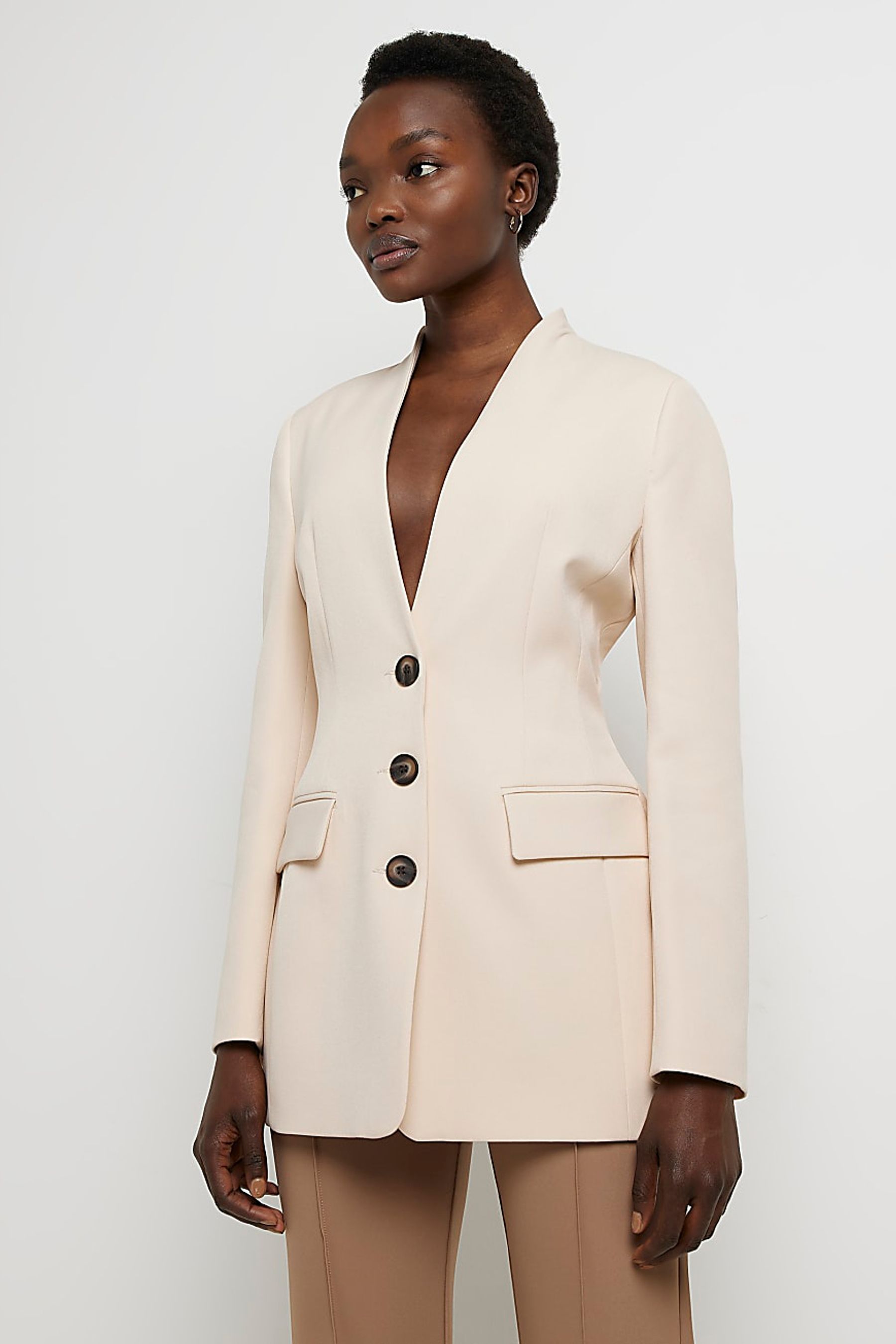 Buy River Island Cream Slim Collarless Button Blazer from Next Ireland