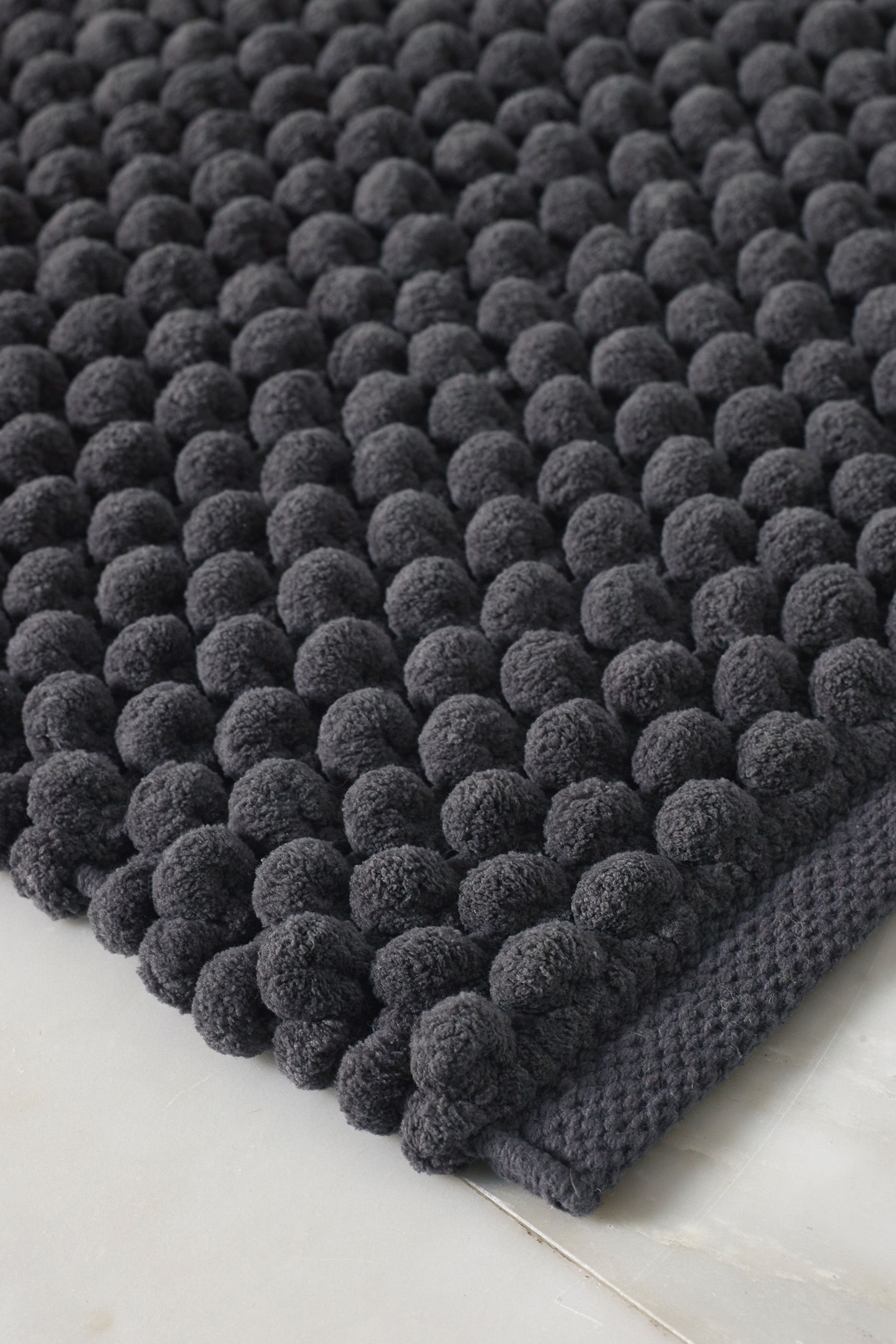 Buy Charcoal Grey Giant Bobble Runner Bath Mat from the Next UK online shop