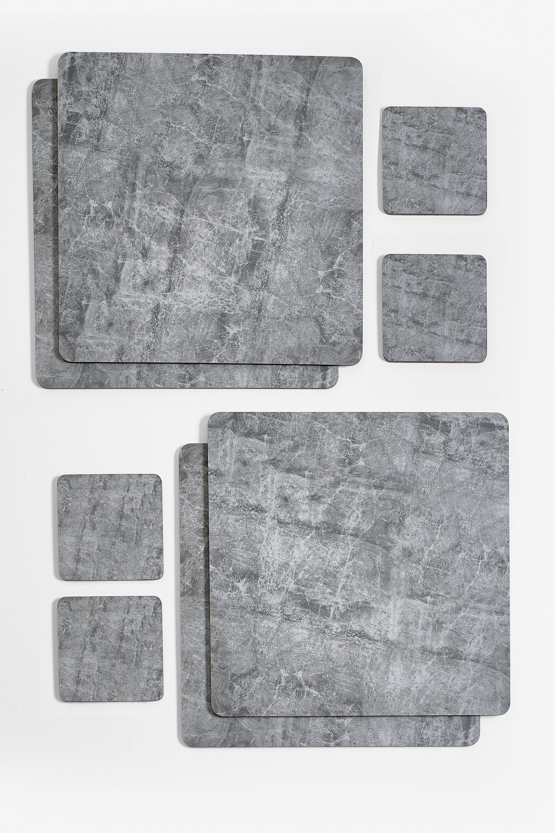 Buy Set of 4 Grey Marble Effect Placemats and Coasters from the Next UK