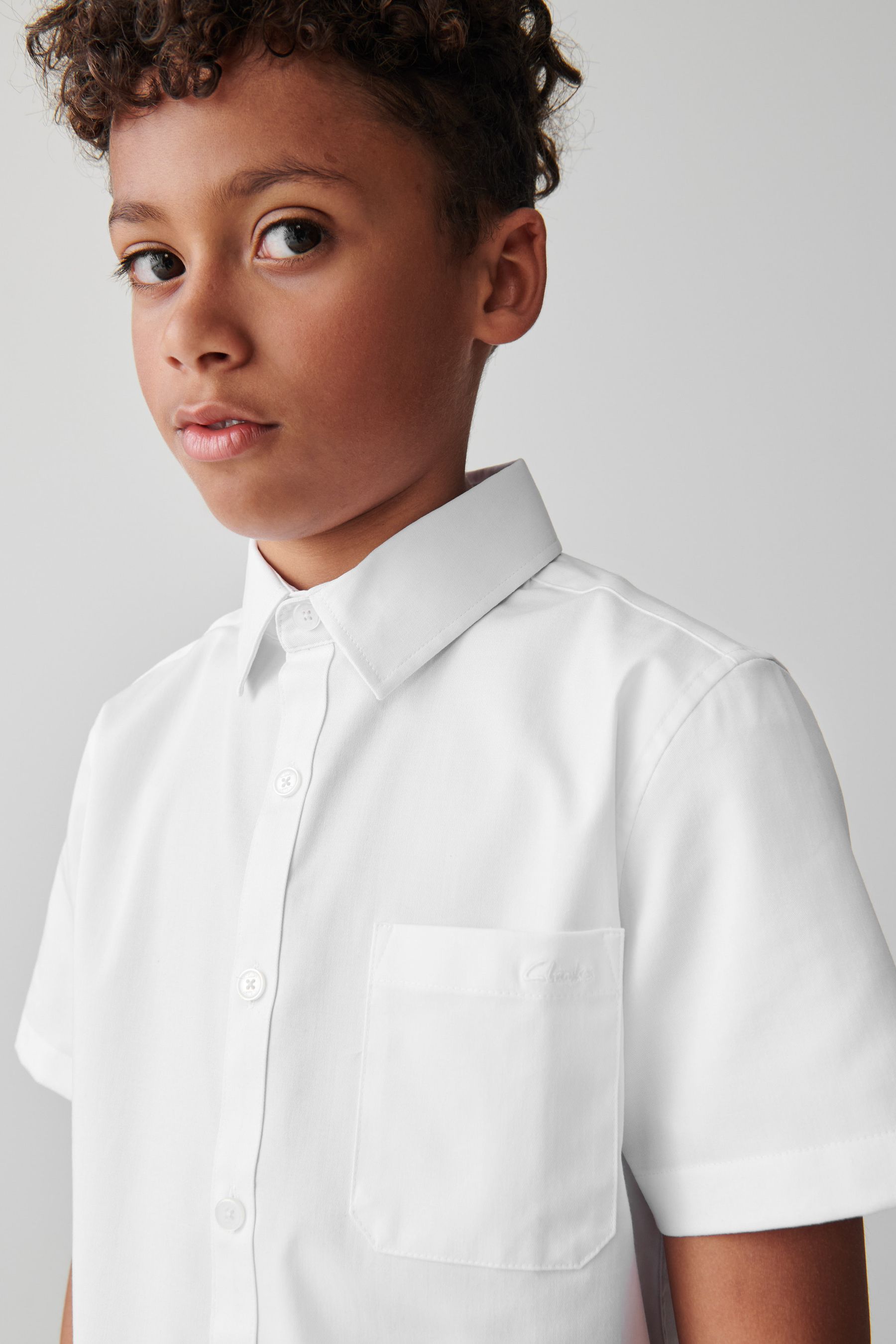Buy Clarks White Short Sleeve Senior Boys School Shirt with Stretch ...