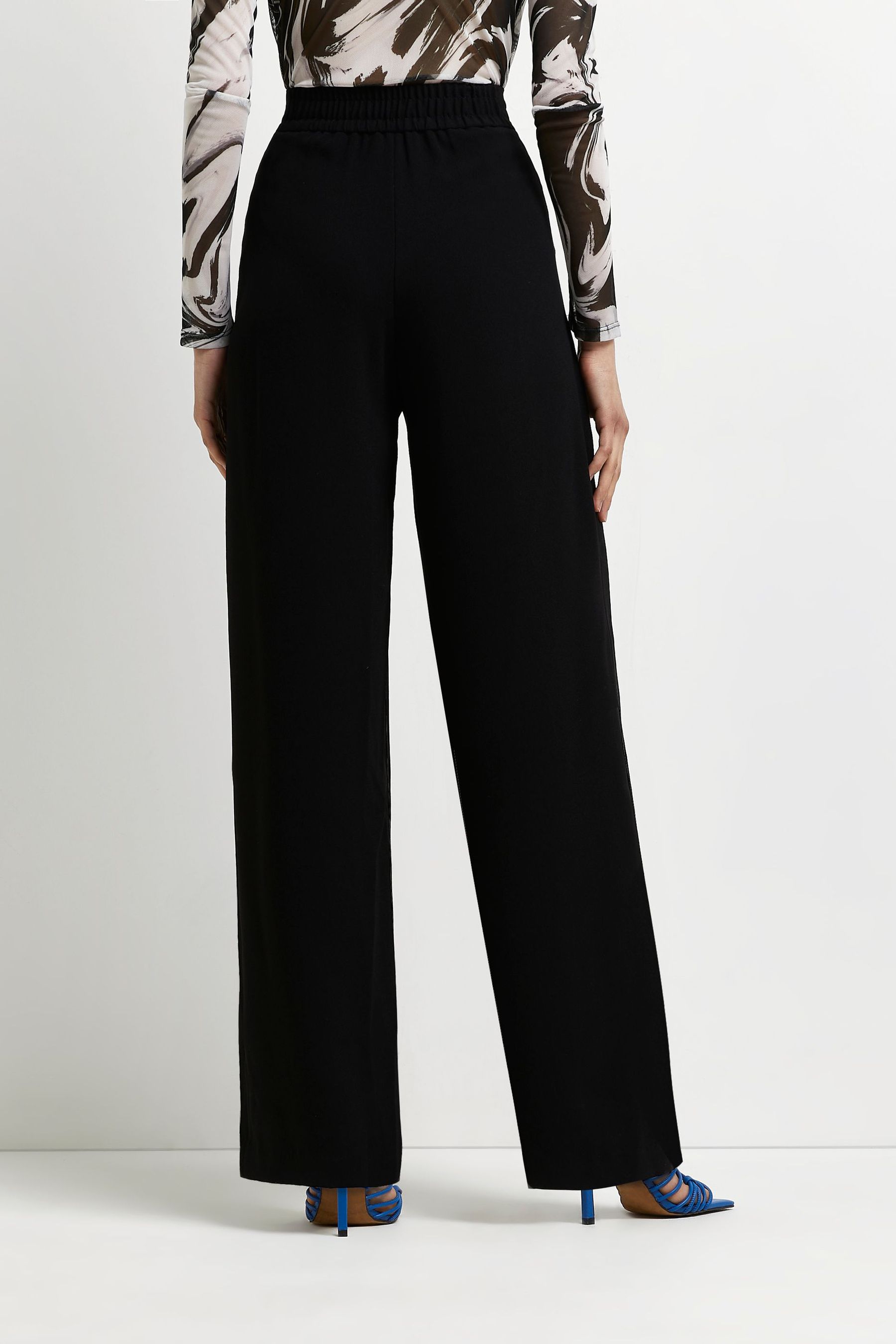 Buy River Island Black Elasticated Smart Trousers from the Next UK