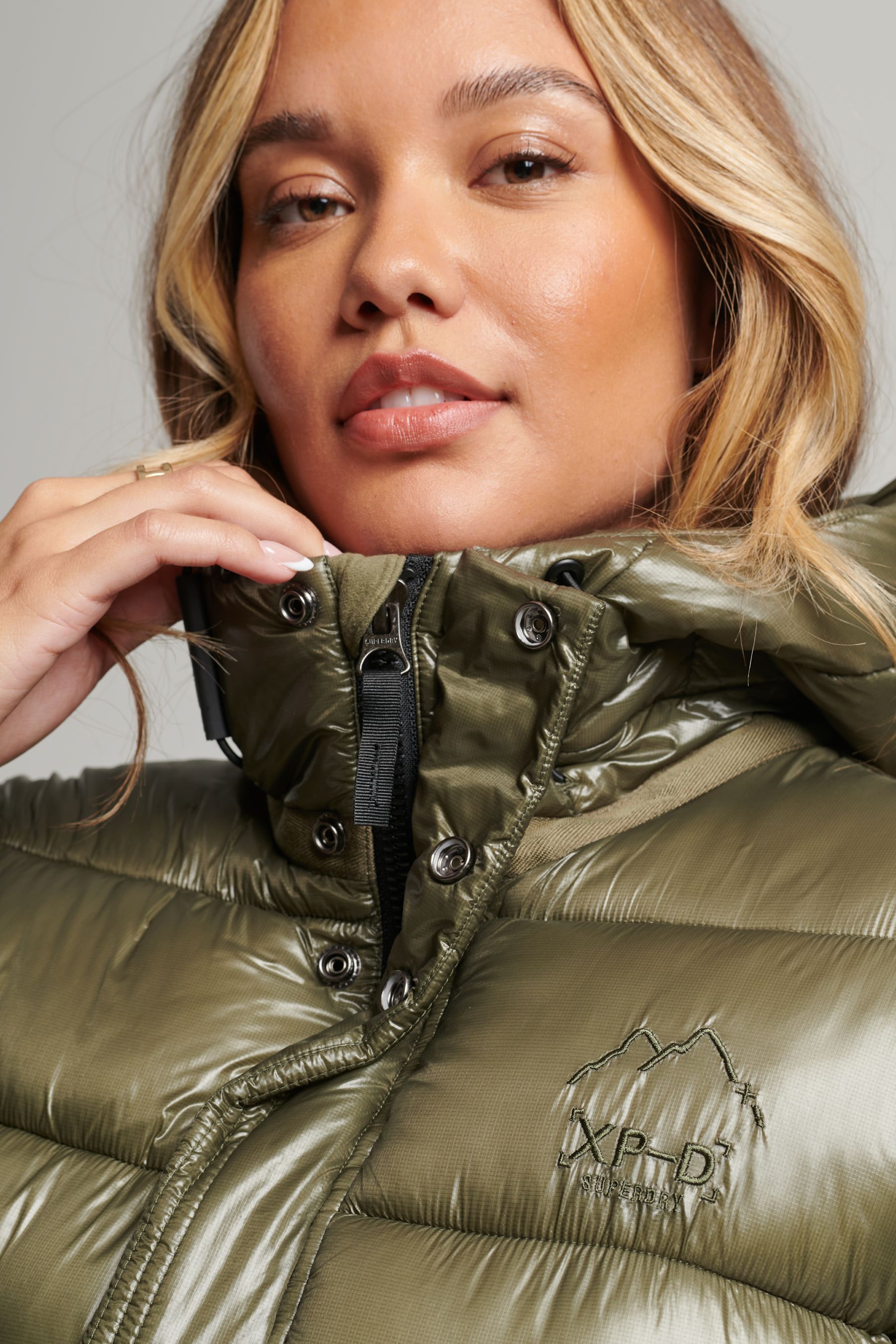 Buy Superdry Green Hooded Shine Sports Puffer Jacket from the Next UK