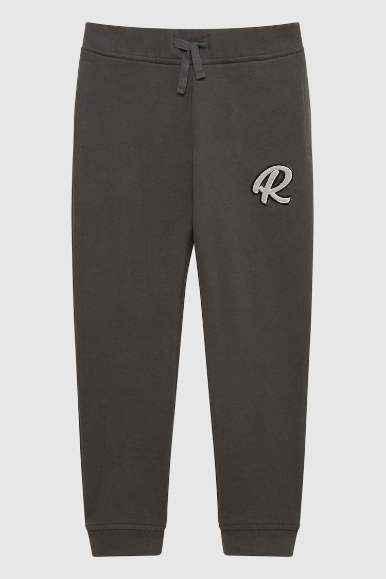 Oliva - Pantalones de chándal de efecto teñido anudado con logo Toby de Reiss - Imagen 1 de 1