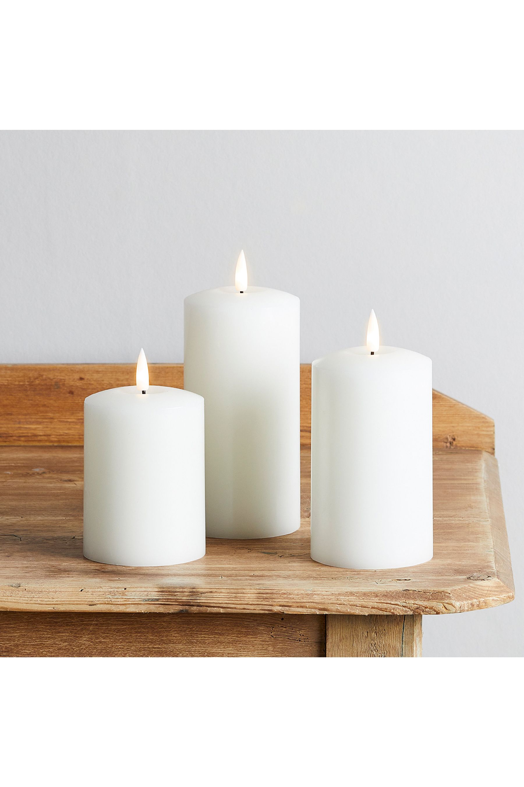 Buy Lights4fun White TruGlow LED Pillar Candle Trio from the Next UK ...