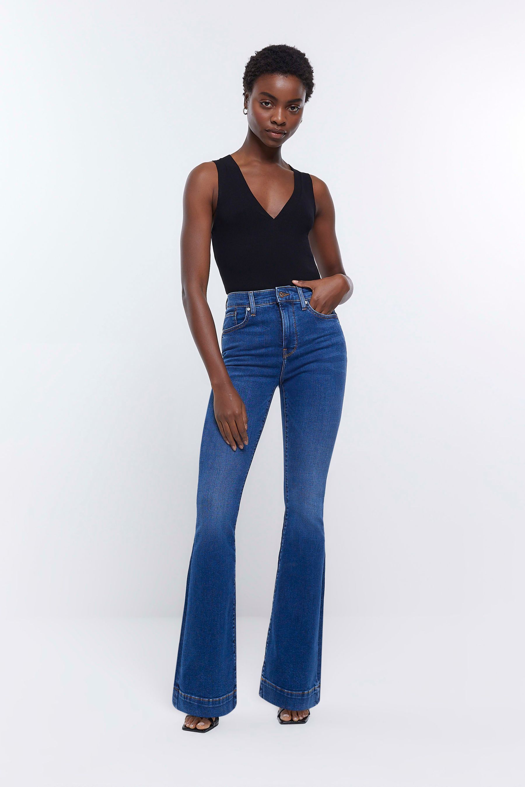 Buy River Island Blue High Rise Tummy Hold Flared Jeans from the Next ...