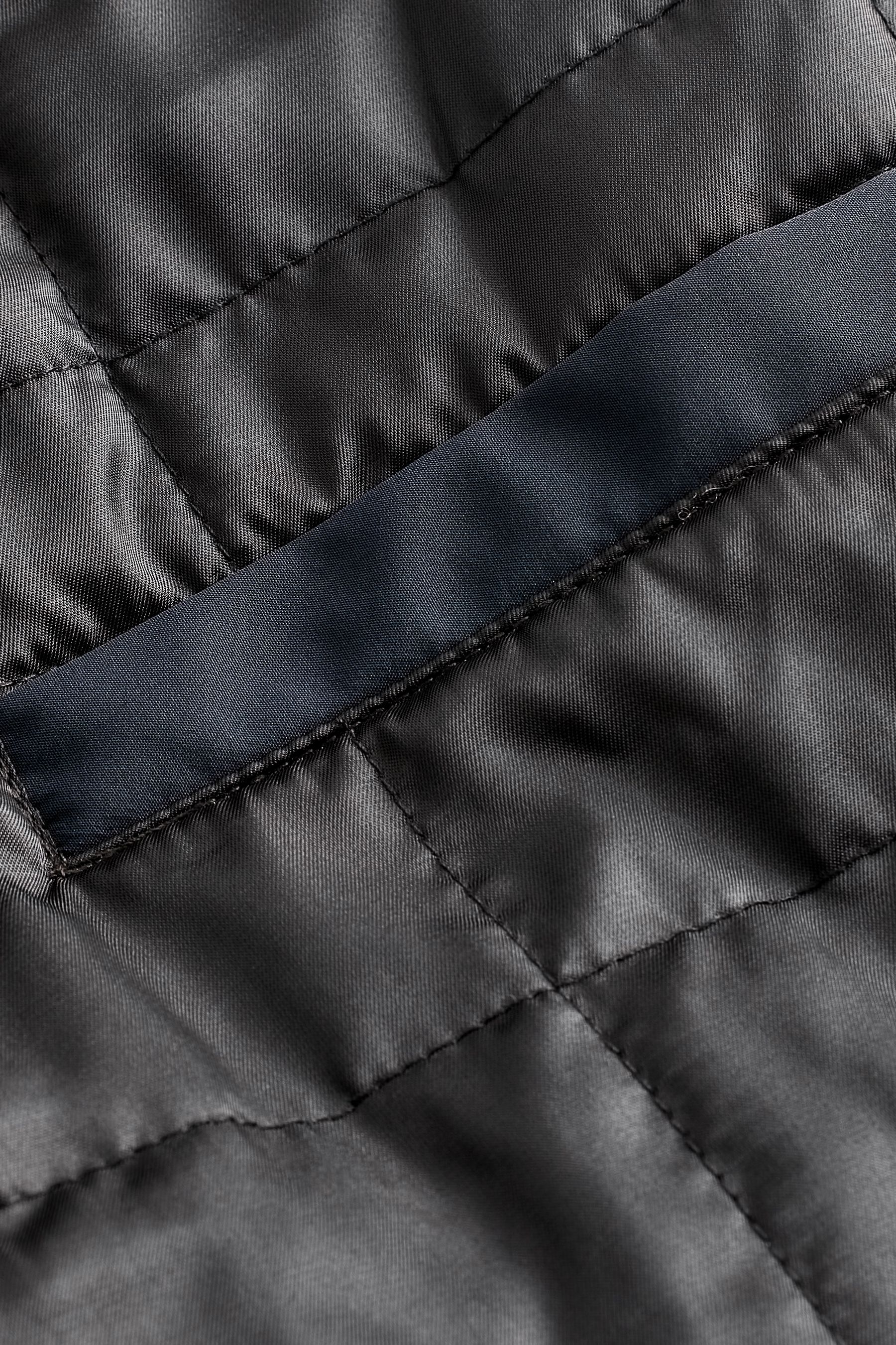 Buy Navy Blue Shower Resistant Four Pocket Funnel Neck Jacket from Next