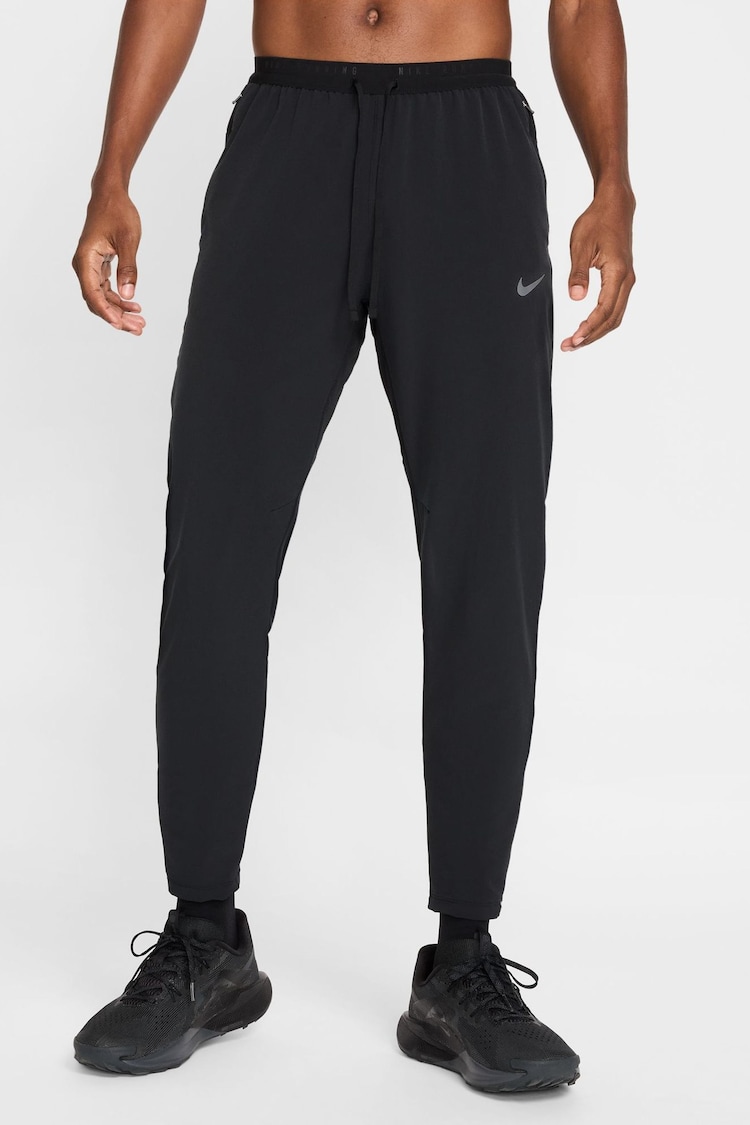 Negro - Nike Dri-FIT Stride Woven Running Joggers - Imagen 1 de 1