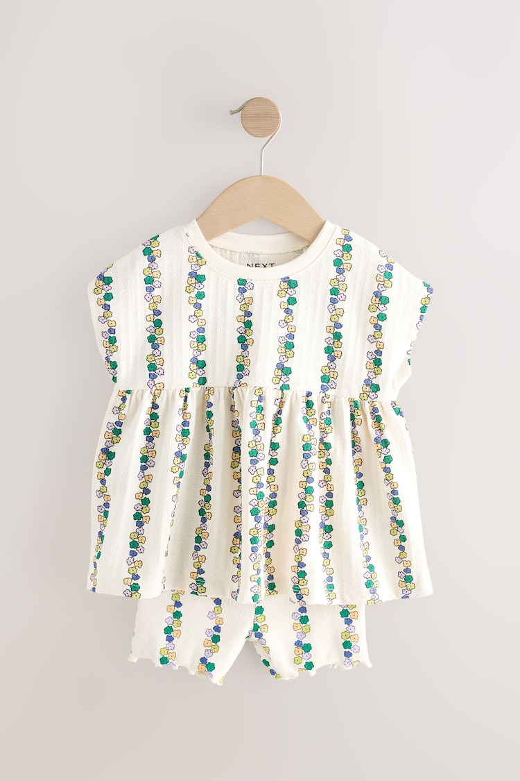 Cream Flowers Short Sleeve Peplum Top and Cycle Shorts Set (3mths-7yrs) - Image 1 of 1