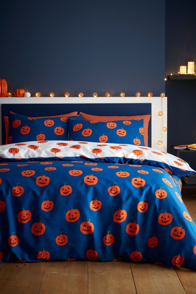 Catherine Lansfield Navy Halloween Pumpkins Reversible Duvet Cover and Pillowcase Set - Image 1 of 1