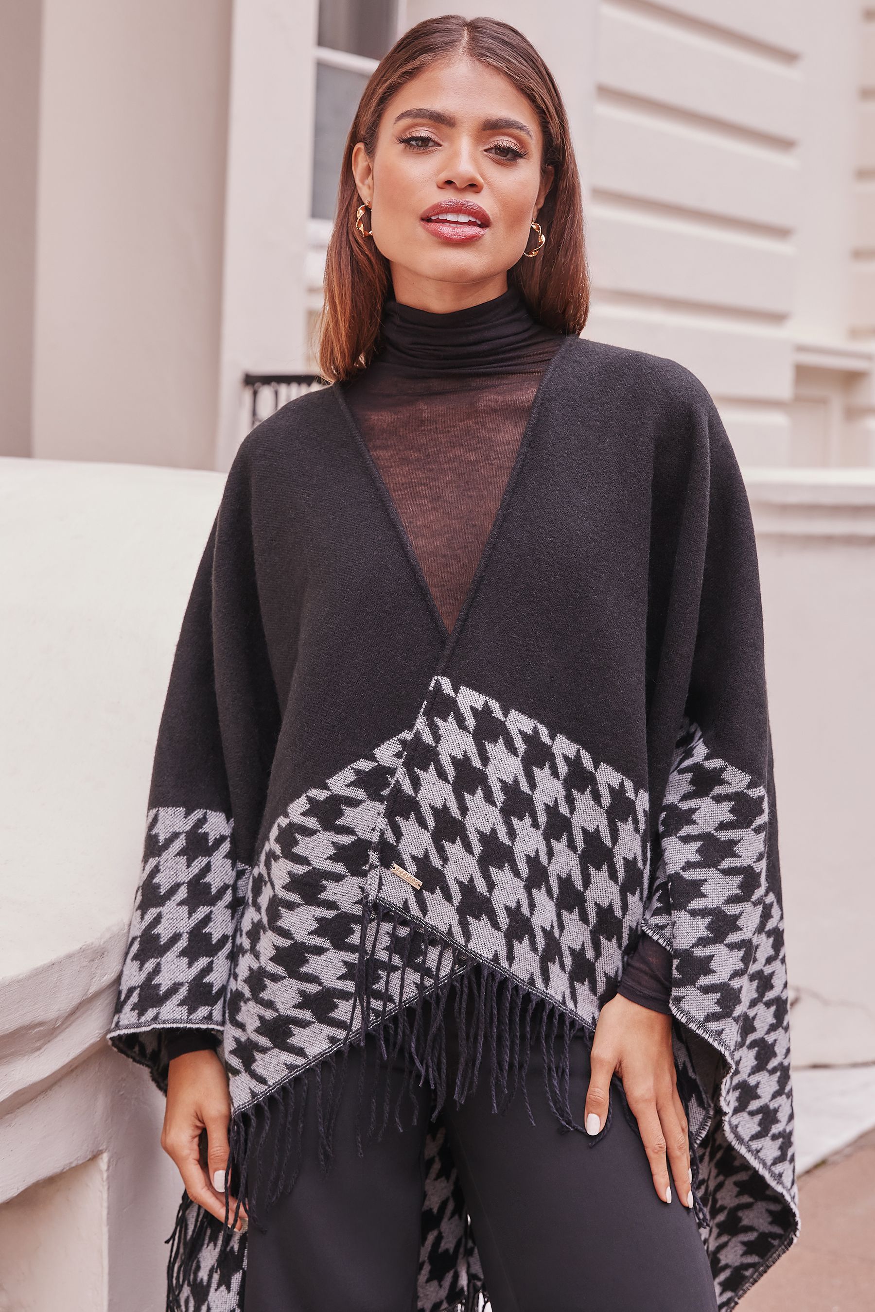 Buy Lipsy Black Super Soft Cosy Dogtooth Printed Cape from the Next UK