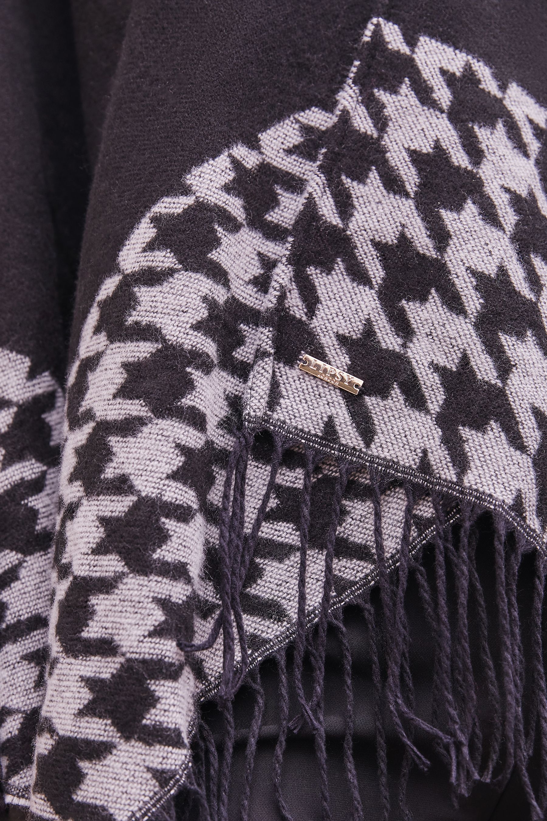 Buy Lipsy Black Super Soft Cosy Dogtooth Printed Cape from the Next UK