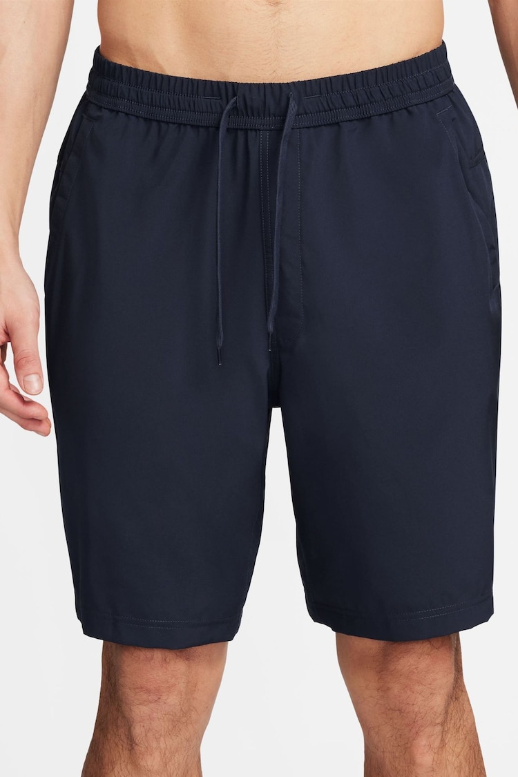 Azul - Pantalones cortos versátiles sin forro de 9 pulgadas Dri-FIT de Nike - Imagen 1 de 1