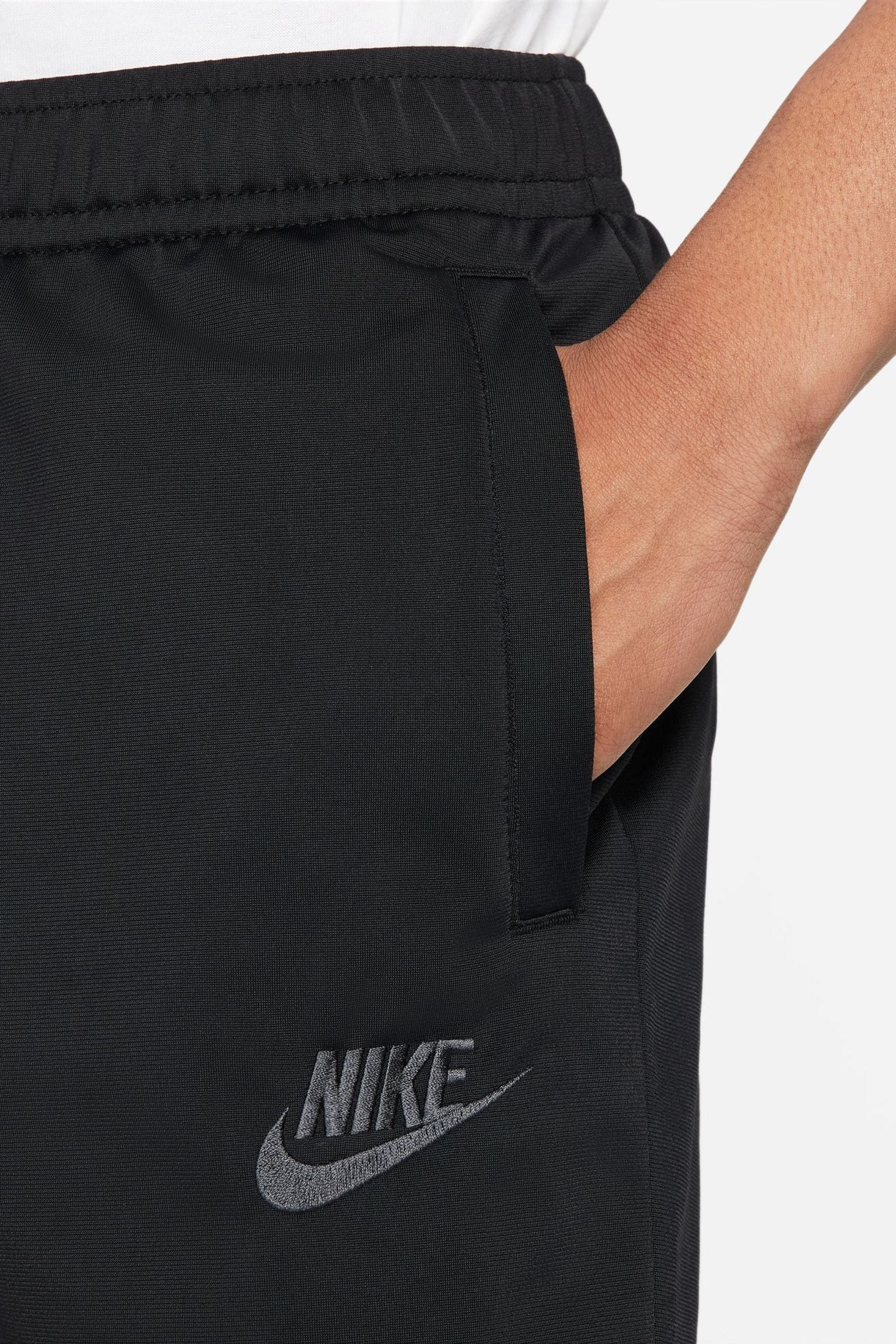 Buy Nike Black Sportswear Sport Essentials Poly Knit Track Suit from ...