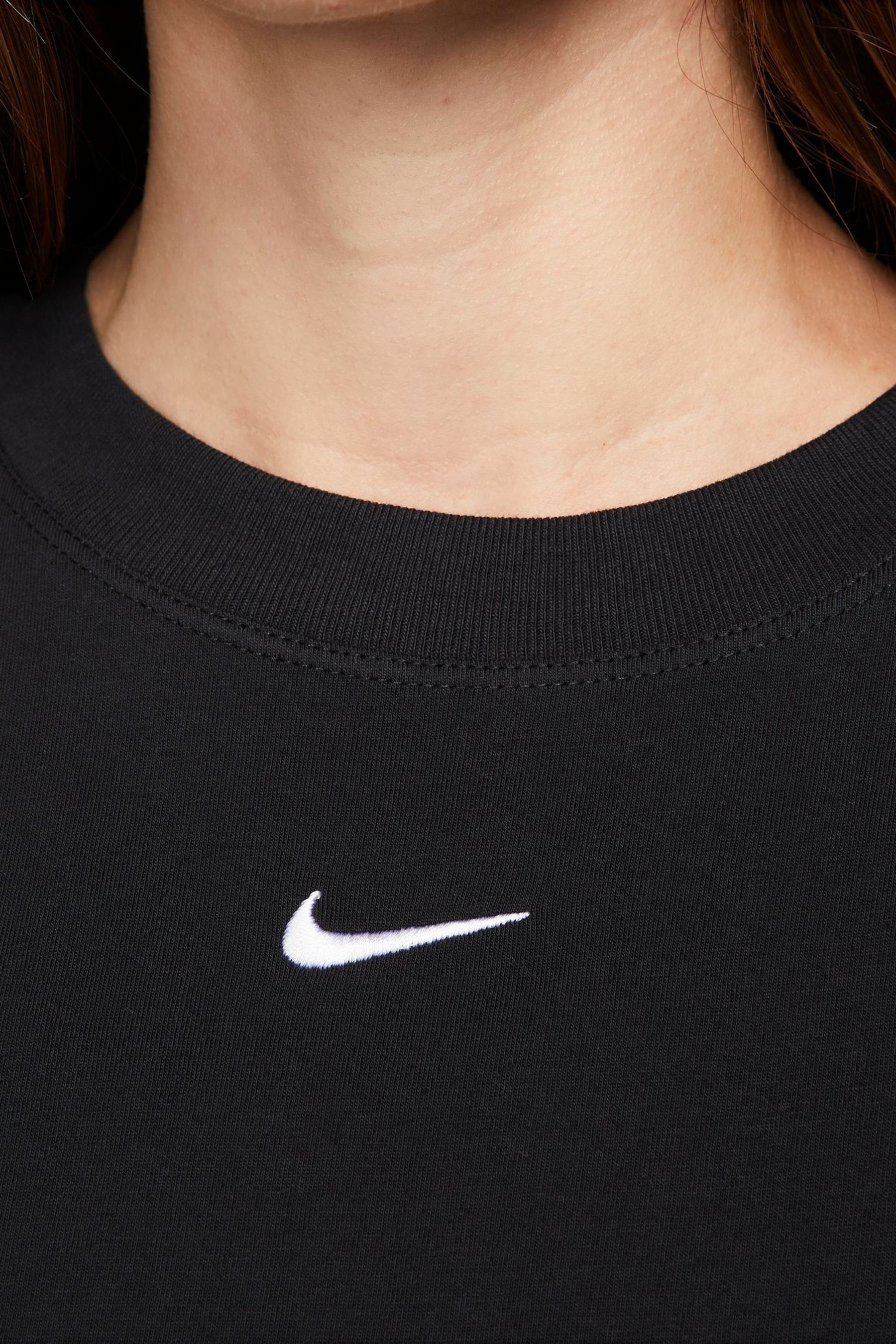 Buy Nike Black Mini Swoosh Oversized T-Shirt from the Next UK online shop